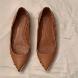 Alexander McQueen gold tipped leather flats